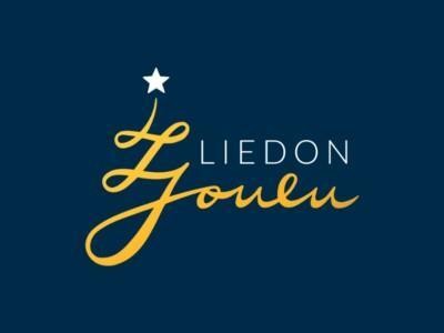 Tummansinisellä taustalla teksti Liedon joulu